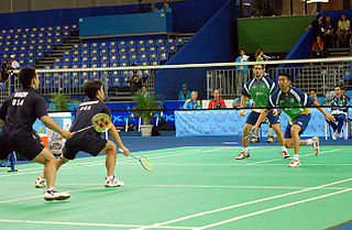 A photo of a badminton match.
