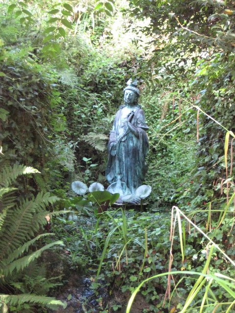 Kwan Yin, Chinese goddess of mercy and compassion. Statue of Kwan Yin in the grounds of Greenway House.